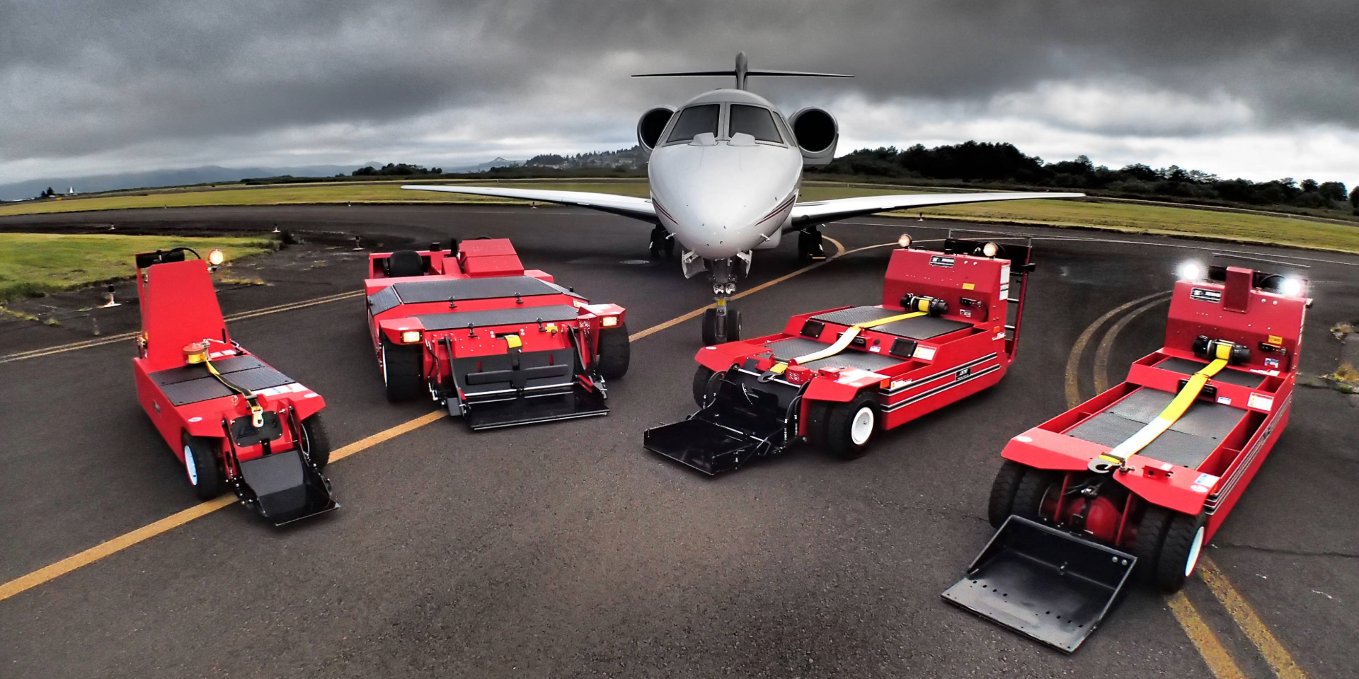 LEKTRO® towbarless aircraft tractors next to an aircraft