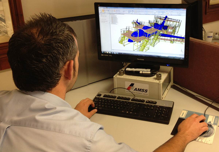 A engineer doing a CAD rendering of airport scaffolding